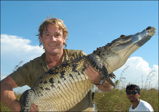 the crocodile and the hunter by bader - Ourboox.com